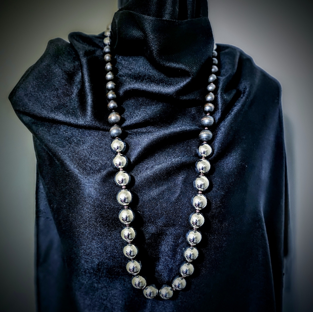 Chico's silver and wood large beaded necklace.